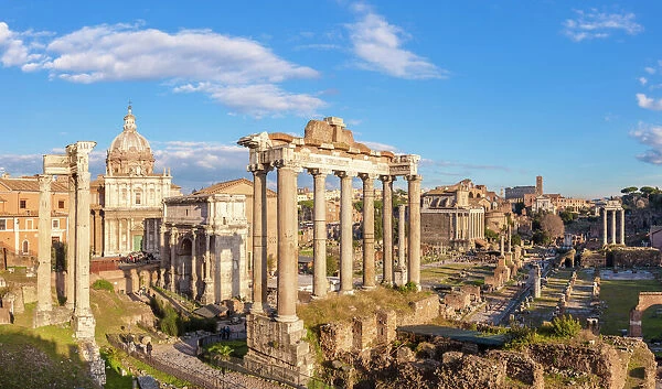 The columns of the Temple of Saturn and overview of the ruined Roman Forum, UNESCO