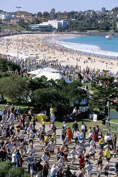 Competitors in the annual City to Surf race at the finish in Bondi, Sydney