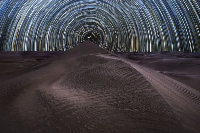 Framed Print : Concentric circumpolar star trail above sand dunes in the Rub al Khali desert, Oman Framed Print : Concentric circumpolar star trail above sand dunes in the Rub al Khali desert, Oman