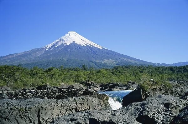 The cone of Volcan Osorno from the Petrohue Falls near Puerto Montt, Chile, South America