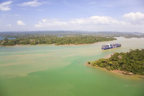 Container ship transiting Panama Canal, Gatun Lake, Panama, Central America