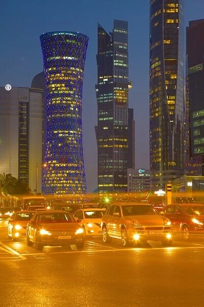 Contemporary architecture and traffic at dusk in the City Centre, Doha, Qatar, Middle East