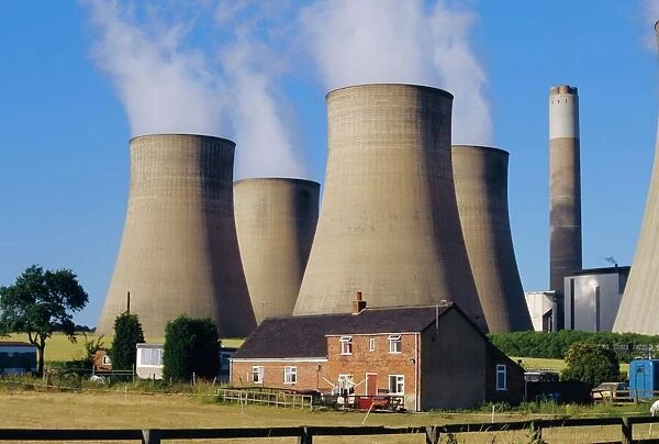 Cooling towers, Radcliffe on Soar Power Station, domestic housing in foreground