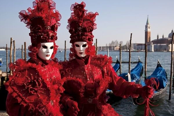 Costumes and masks during Venice Carnival, Venice, UNESCO World Heritage Site