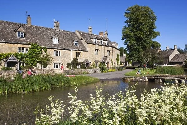 Cotswold cottages on the River Eye, Lower Slaughter, Gloucestershire, Cotswolds, England, United Kingdom, Europe