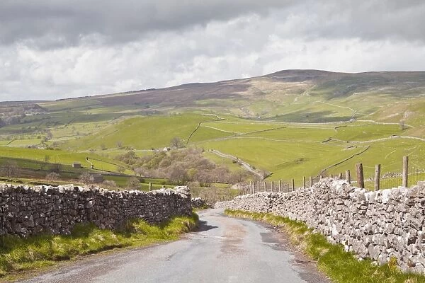 A country road in the Yorkshire Dales near to Malham, Yorkshire, England, United Kingdom, Europe