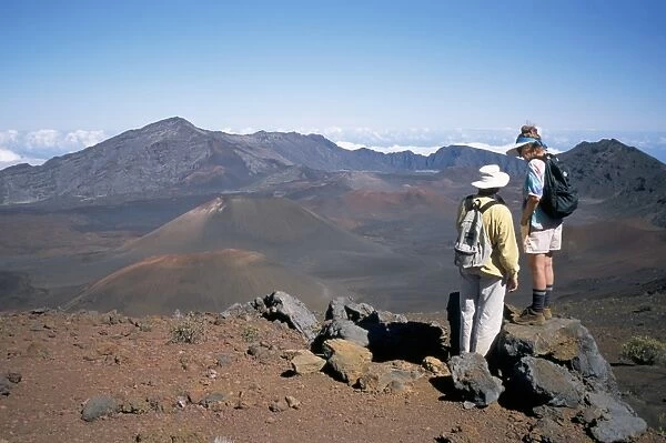 Couple on rim of Haleakala volcano