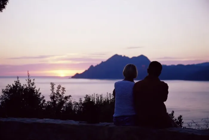 Framed Print : Couple watching sunset near Porto, Corsica, France, Mediterranean, Europe Framed Print : Couple watching sunset near Porto, Corsica, France, Mediterranean, Europe