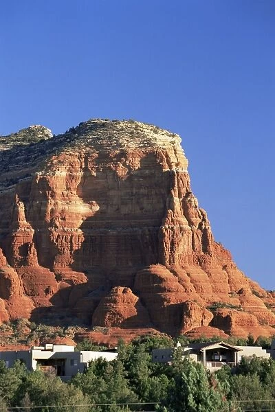 Courthouse Butte towering above prestigious properties