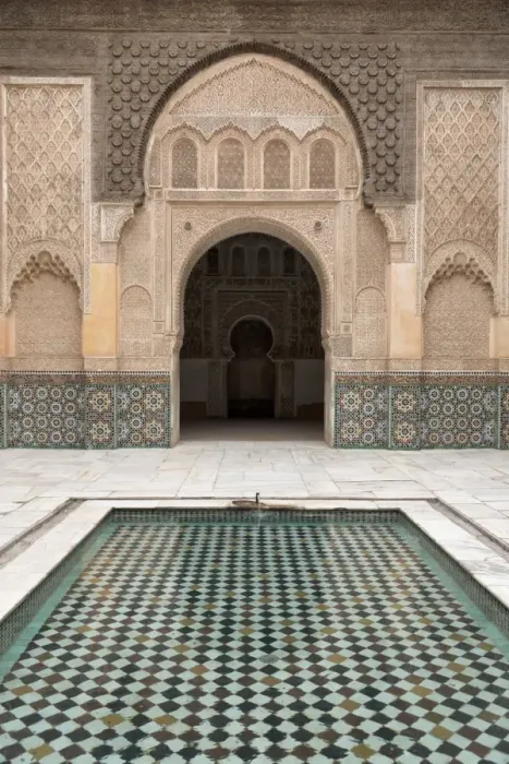 Framed Print : Courtyard and pool with traditional Moroccan ornate doorway in the Ben Youssef Medersa, UNESCO World Heritage Site, Marrakech, Morocco, North Africa, Africa Framed Print : Courtyard and pool with traditional Moroccan ornate doorway in the Ben Youssef Medersa, UNESCO World Heritage Site, Marrakech, Morocco, North Africa, Africa