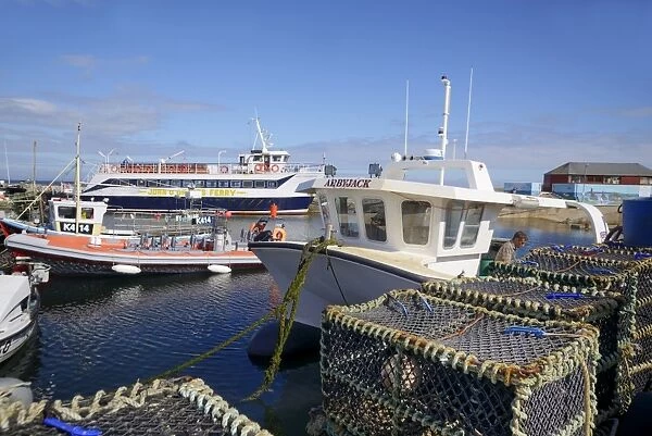 Crab pots and boats in the harbour, John O Groats, Caithness, Highland Region, Scotland, United Kingdom, Europe