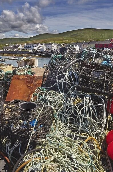 Crab pots piled up on the wharf at Portmagee, Skelligs Ring, Ring of Kerry, County Kerry