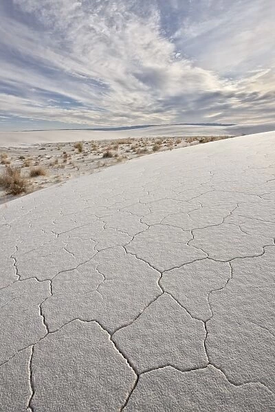 Cracked dunes with clouds, White Sands National Monument, New Mexico, United States of America, North America
