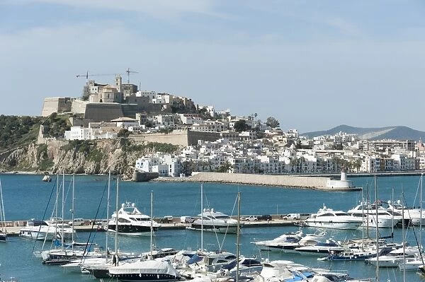 Cranes at Ibiza Castle and view of the boats, Ibiza port, Dalt Vila, Old Town, Ibiza, Balearic Islands, Spain, Mediterranean, Europe