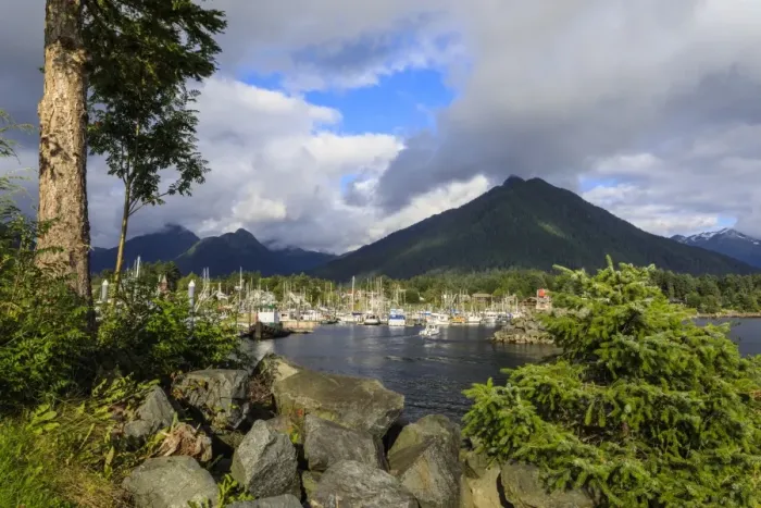 Framed Print : Crescent Boat harbour with beautiful wooded mountains and town of Sitka, rare sunny day Framed Print : Crescent Boat harbour with beautiful wooded mountains and town of Sitka, rare sunny day