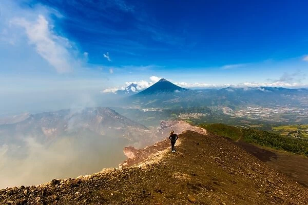 Cresting the peak of Pacaya Volcano in Guatemala City, Guatemala, Central America