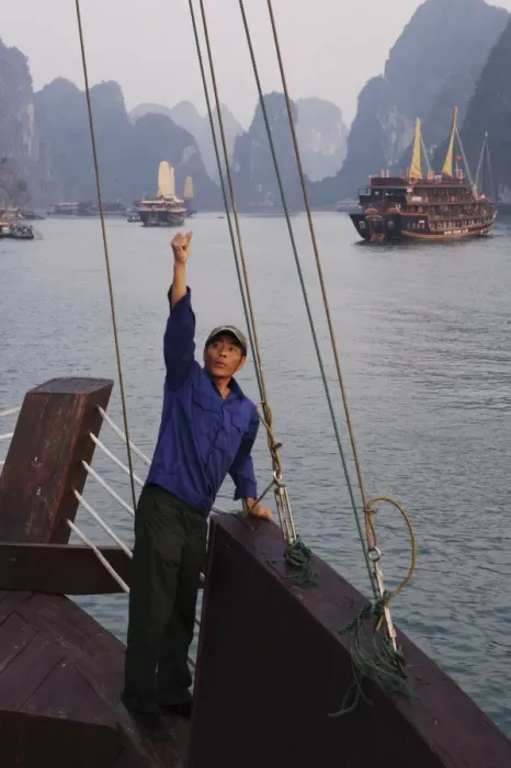 Framed Print : Crewman raises anchor on junk Ha Long Bay, Vietnam, Indochina, Southeast Asia, Asia Framed Print : Crewman raises anchor on junk Ha Long Bay, Vietnam, Indochina, Southeast Asia, Asia