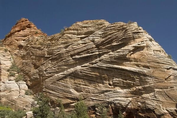 Cross-bedded sandstone formations (ancient sand dunes), seen from the Zion to Mount Carmel Highway