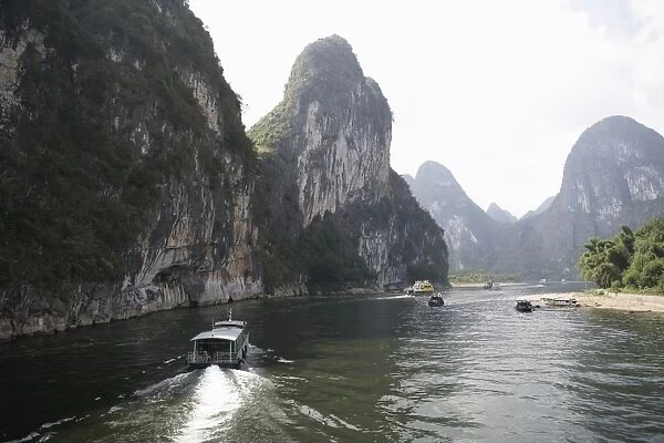 Cruise boats on Li River between Guilin and Yangshuo, Guilin, Guangxi Province
