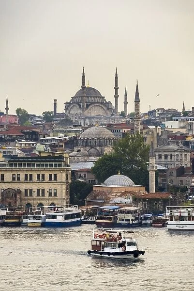 Cruise on the Golden Horn with Mosque behind, Istanbul, Turkey, Europe