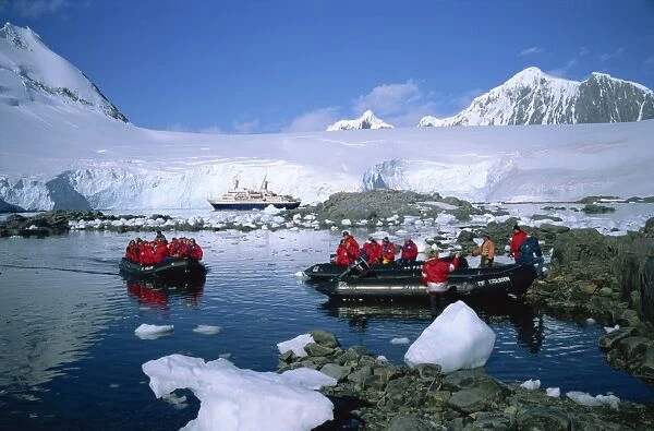 Cruise passengers on excursion by dinghy, Port Lockroy, once a Second World War British Station
