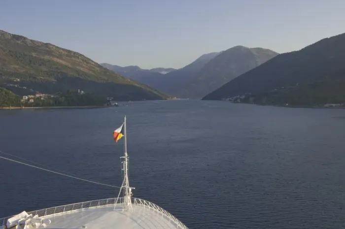 Framed Print : A cruise ship begins its early morning navigation of the winding route to Kotor, Montenegro, Europe Framed Print : A cruise ship begins its early morning navigation of the winding route to Kotor, Montenegro, Europe