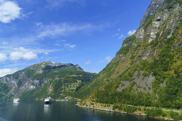 Cruiseships moored at the head of Geirangerfjord by the village of Geiranger, UNESCO