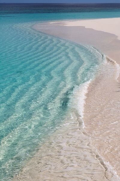 The crystal clear water of the Indian Ocean on an island in the Maldives, Indian Ocean, Asia