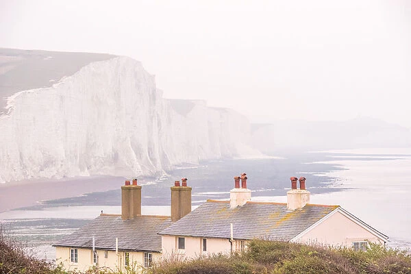 Cuckmere Haven and the Seven Sisters chalk cliffs on a misty day, South Downs National Park