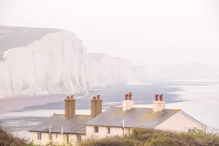 Framed Print : Cuckmere Haven and the Seven Sisters chalk cliffs on a misty day, South Downs National Park Framed Print : Cuckmere Haven and the Seven Sisters chalk cliffs on a misty day, South Downs National Park