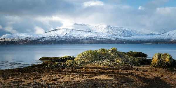 Cuillin Mountain range in the snow from Ord Beach, Isle of Skye, Inner Hebrides, Scotland