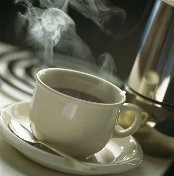 Cup of steaming coffee