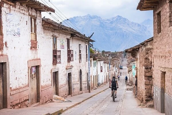 Cycling through Maras, near Cusco (Cuzco), Peru, South America