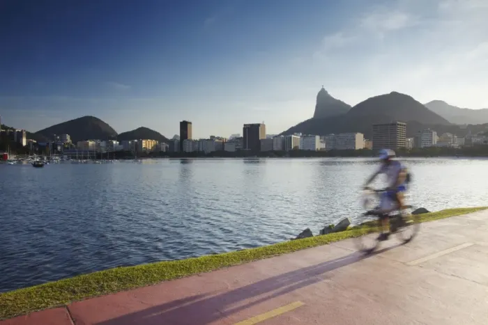 Framed Print : Cyclist on pathway around Botafogo Bay with Christ the Redeemer statue (Cristo Redentor) in the background, Rio de Janeiro, Brazil, South America Framed Print : Cyclist on pathway around Botafogo Bay with Christ the Redeemer statue (Cristo Redentor) in the background, Rio de Janeiro, Brazil, South America