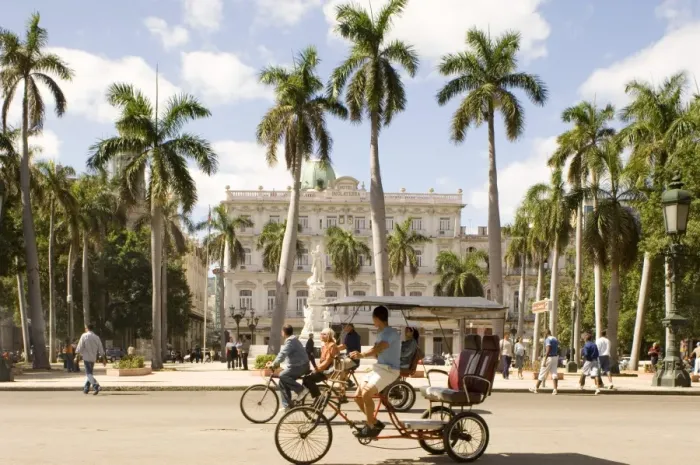 Framed Print : Cyclo-taxis passing the Parque Central, Central Havana, Cuba, West Indies Framed Print : Cyclo-taxis passing the Parque Central, Central Havana, Cuba, West Indies