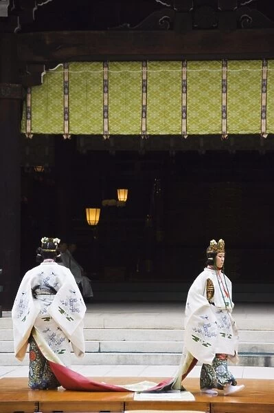 Dance by shrine maidens in special kimono on Culture