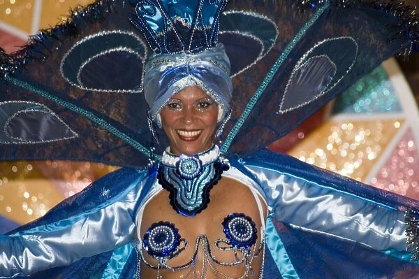 A dancer in an elaborate sequined costume performing at the Brisas Trinidad del Mar Hotel near Trinidad, Cuba, West Indies