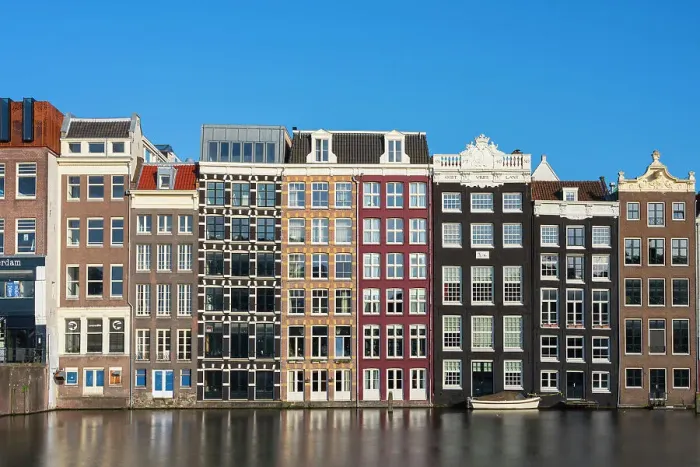 Framed Print : Dancing houses at Damrak, Amsterdam, The Netherlands, Europe Framed Print : Dancing houses at Damrak, Amsterdam, The Netherlands, Europe
