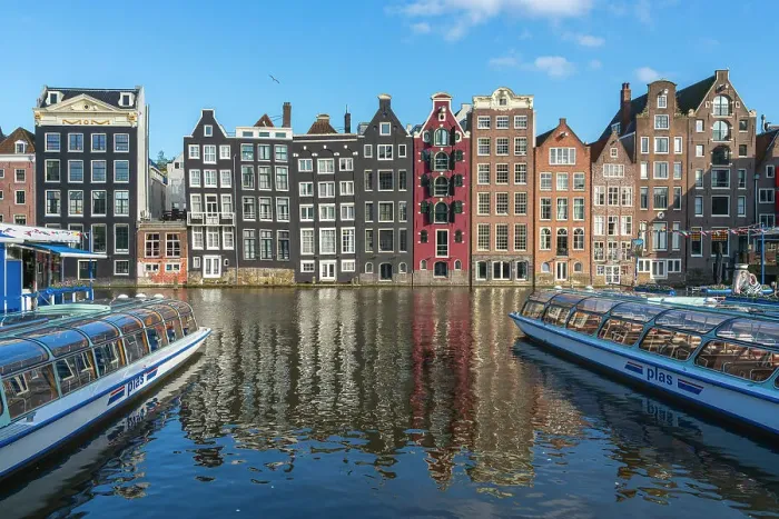 Framed Print : Dancing houses at Damrak, Amsterdam, The Netherlands, Europe Framed Print : Dancing houses at Damrak, Amsterdam, The Netherlands, Europe
