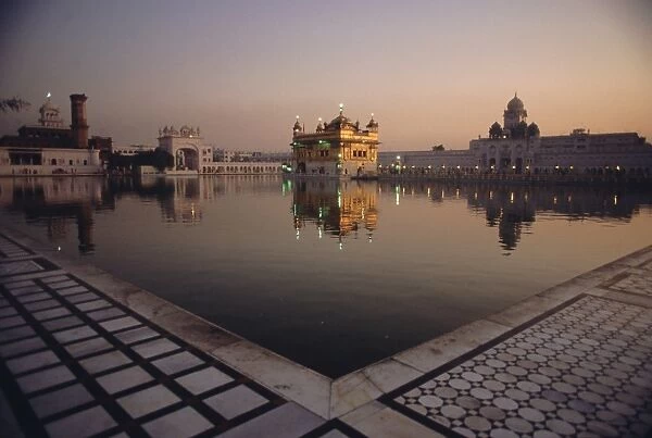 Dawn at the Golden Temple and cloisters and the Holy Pool of Nectar