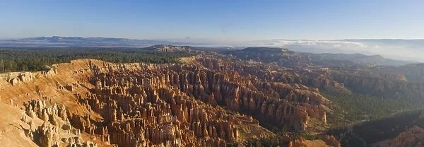 Dawn with low mist over the sandstone hoodoos in Bryce Amphitheater, Inspiration Point