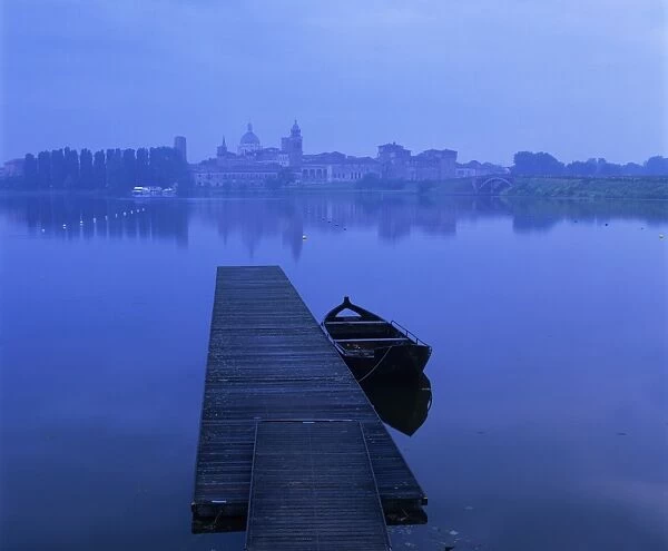 Dawn mist over old town and Lake Inferiore, Mantua, Lombardy, Italy, Europe