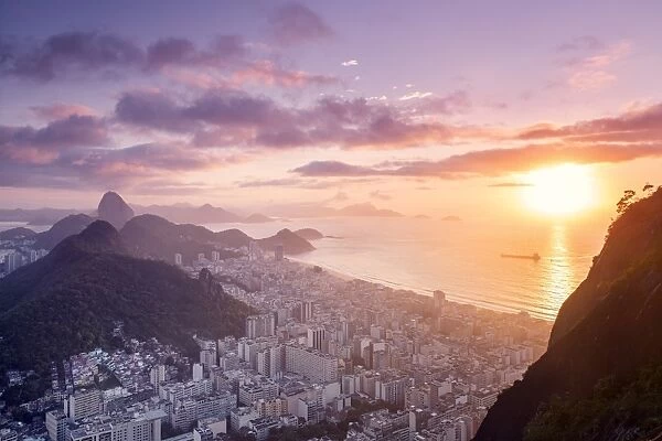 Dawn view of the Sugar Loaf, Sao Joao favela, Guanabara bay, the Atlantic and the mountains of Rio