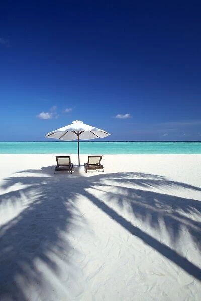 Deck chairs and tropical beach, Maldives, Indian Ocean, Asia