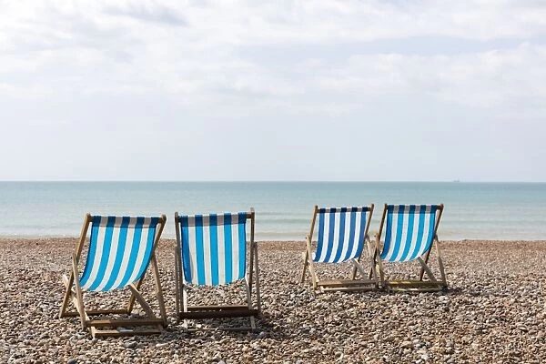 Deckchairs on the beach, Brighton, East Sussex, England, United Kingdom, Europe