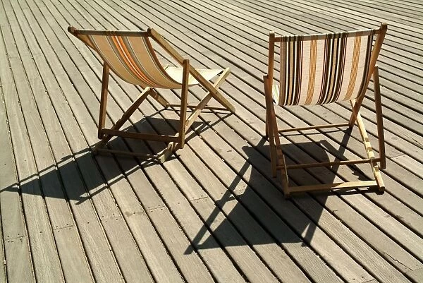 Deckchairs on the seafront boardwalk (la planche), Deauville, Cote Fleurie