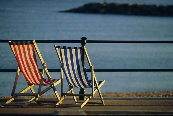 Two deckchairs on the seafront, Sidmouth, Devon, England, UK, Europe