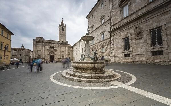 The decorated fountain frames the Cathedral in Arringo Square, Ascoli Piceno, Marche