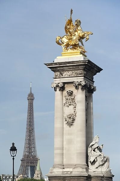 Decorated pillar of Alexandre III Bridge and the Eiffel Tower, Paris, France, Europe