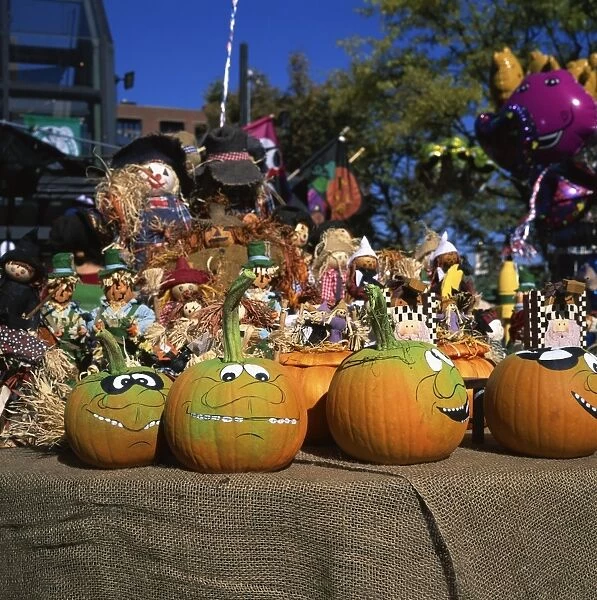 Decorated pumpkins on sale for Halloween